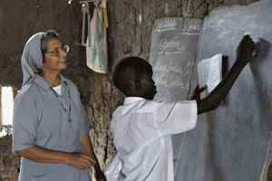 Religiosa misionera en una escuela en Africa