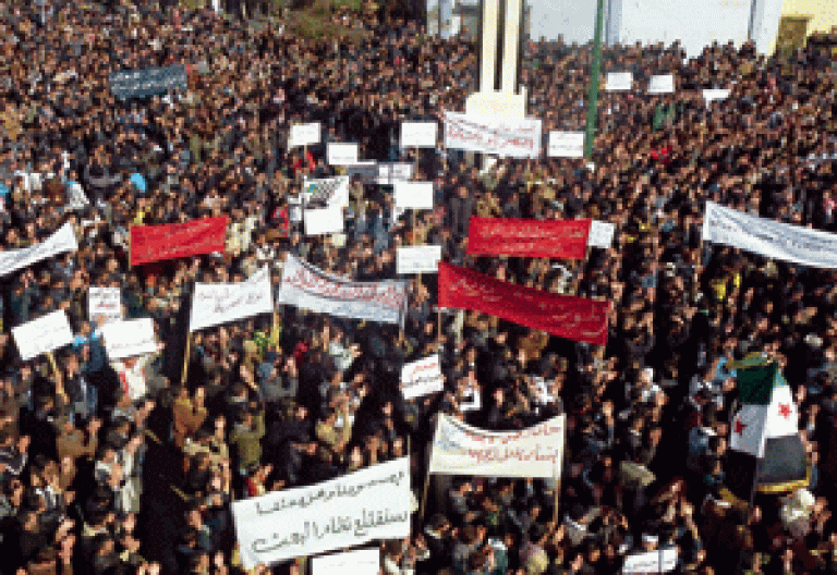 manifestantes opositores al régimen de Al Asad en Siria
