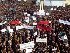 manifestantes opositores al régimen de Al Asad en Siria