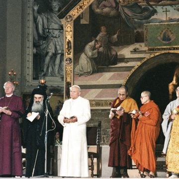 Pope John Paul II attends an interreligious peace meeting in Assisi, Italy, in this Oct. 27, 1986,
