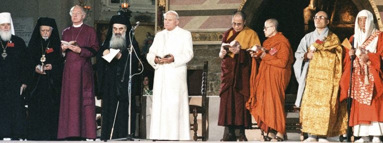 Pope John Paul II attends an interreligious peace meeting in Assisi, Italy, in this Oct. 27, 1986,