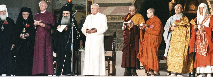 Pope John Paul II attends an interreligious peace meeting in Assisi, Italy, in this Oct. 27, 1986, file photo. Pope Francis will join dozens of religious leaders in Assisi Sept. 20 for an interfaith peace meeting marking the 30th anniversary of the 1986 encounter. Pictured from left are: Metropolitan Filaret of the Russian Orthodox Church; Bishop Gabriel of Palmyra, representing the Greek Orthodox Church of Antioch; Orthodox Archbishop Methodios; Archbishop of Canterbury Robert Runcie, spiritual head of the worldwide Anglican Communion; Pope John Paul II; the Dalai Lama; Venerable Maha Ghosananda of Cambodia; Venerable Eui-Hyun Seo of Korea; and Venerable Etai Yamada of Japan. (CNS photo/L'Osservatore Romano) See POPE-ASSISI-PEACE Sept. 1, 2016.