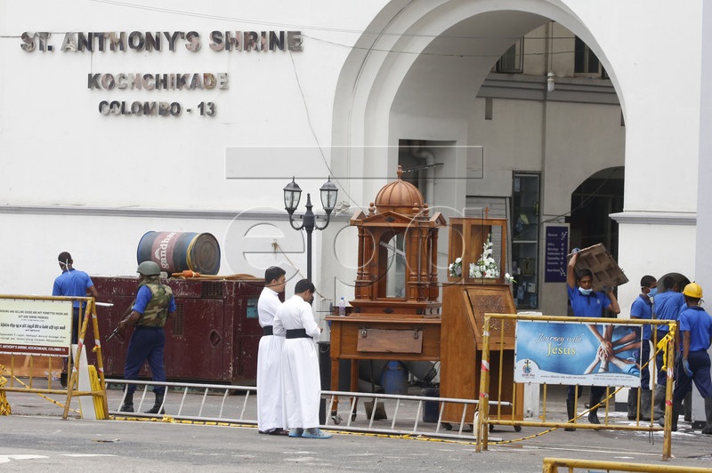 epa07531534 Workers engaged in cleaning at St. Anthony's Church, one of the sites of recent blasts, in Colombo, Sri Lanka, 27 April 2019. According to reports, security was on high alert in the mosques and churches across Sri Lanka after at least 259 people were killed and hundreds more injured in a coordinated series of blasts during the Easter Sunday service at churches and hotels on 21 April 2019. EPA-EFE/M.A. PUSHPA KUMARA